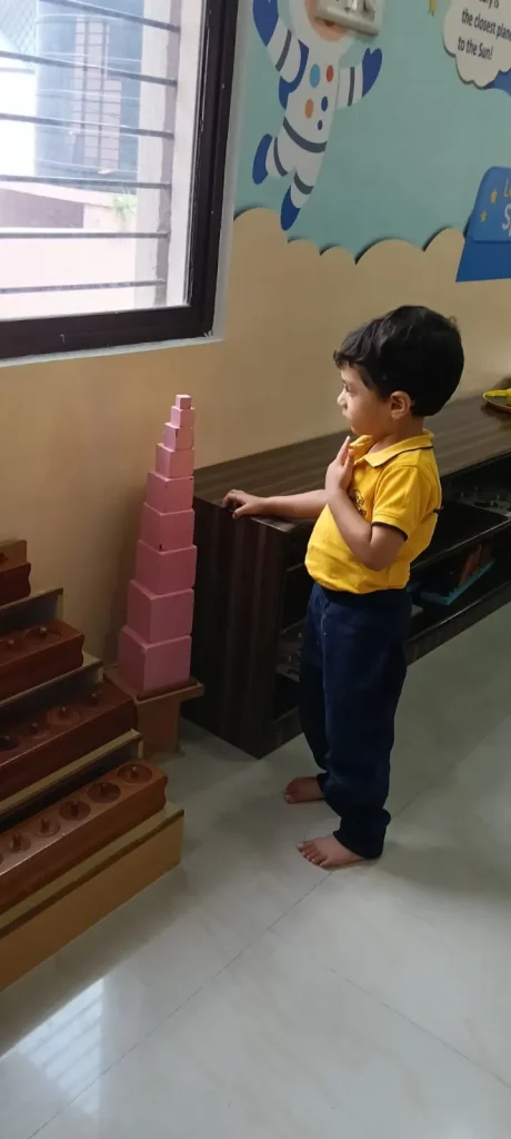Child choosing a letter board at ACE Montessori, Padmanabhanagar and Jayanagar, Bangalore