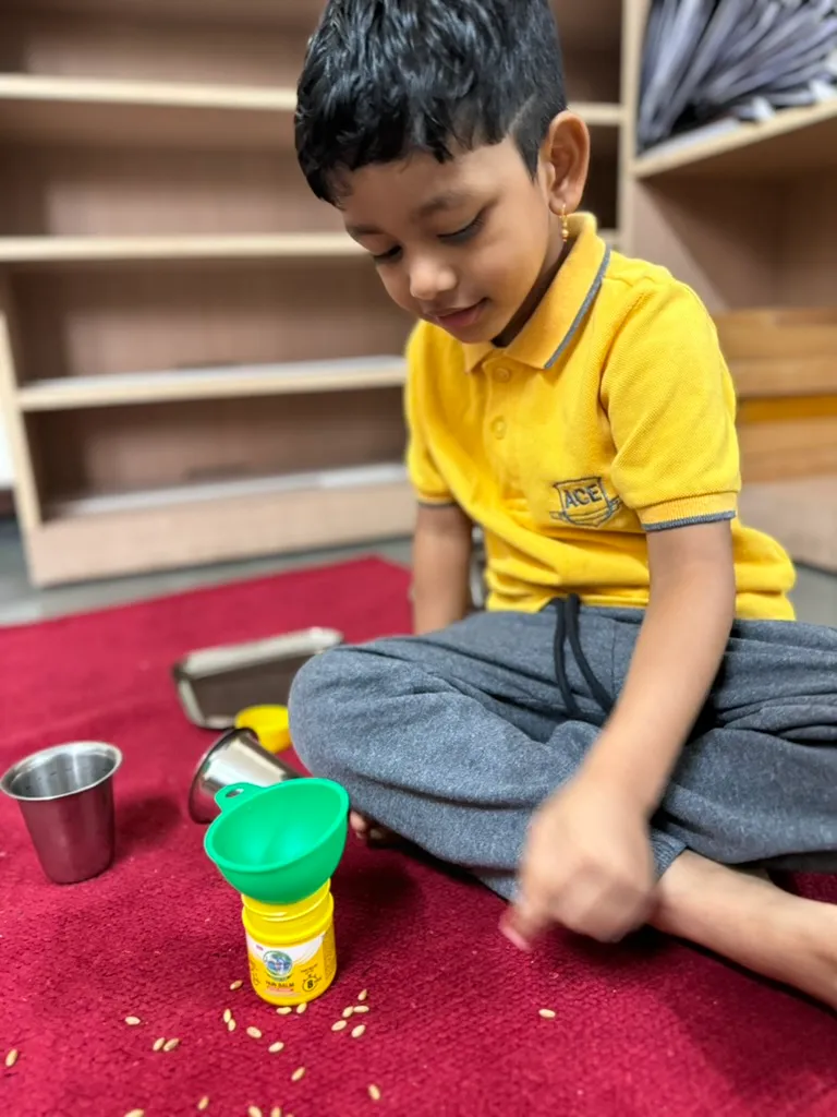 Child doing a Montessori activity at our preschool in Jayanagar, Bangalore