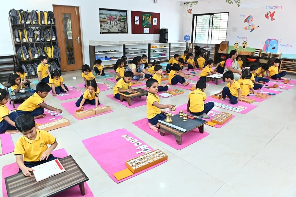 Child doing a pouring activity at ACE Montessori, Padmanabhanagar and Jayanagar, Bangalore