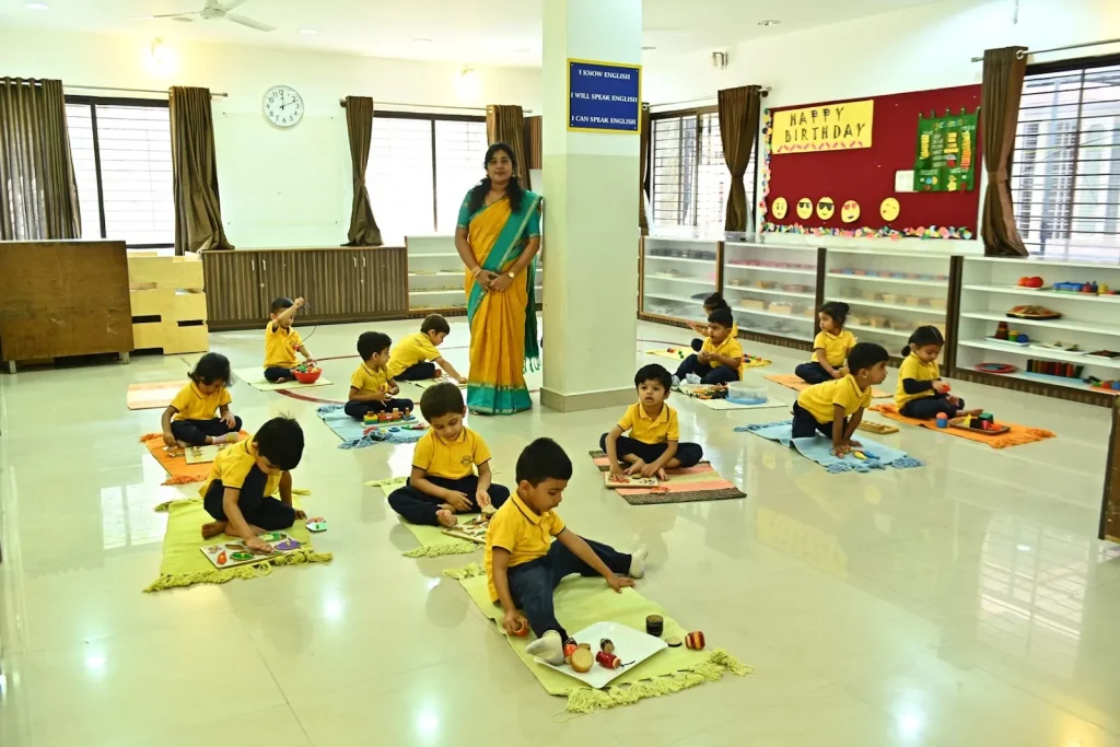 Child focused on Montessori work at ACE Montessori, Padmanabhanagar and Jayanagar, Bangalore