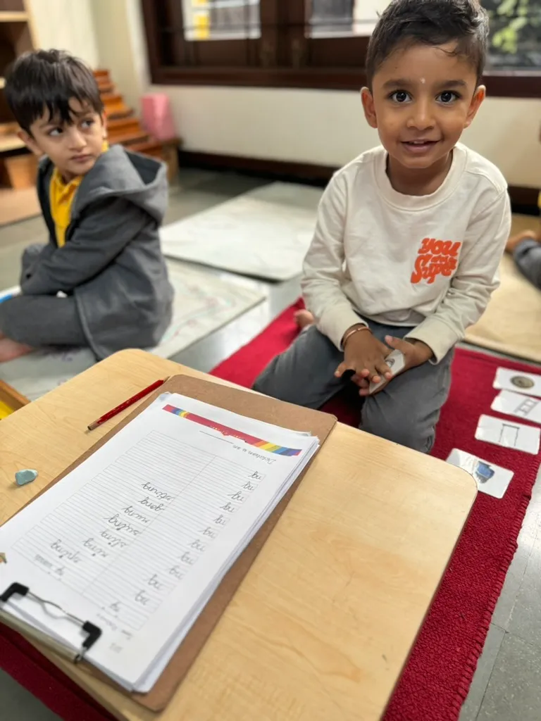 Child practising writing at ACE Montessori, Padmanabhanagar and Jayanagar, Bangalore