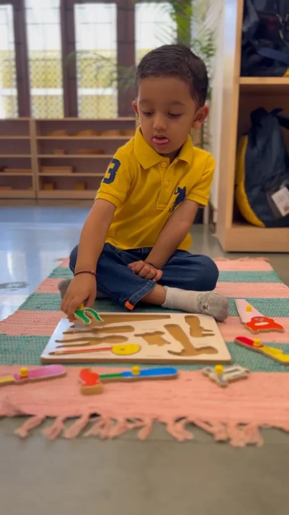 Child working with maths material at ACE Montessori, Padmanabhanagar and Jayanagar, Bangalore