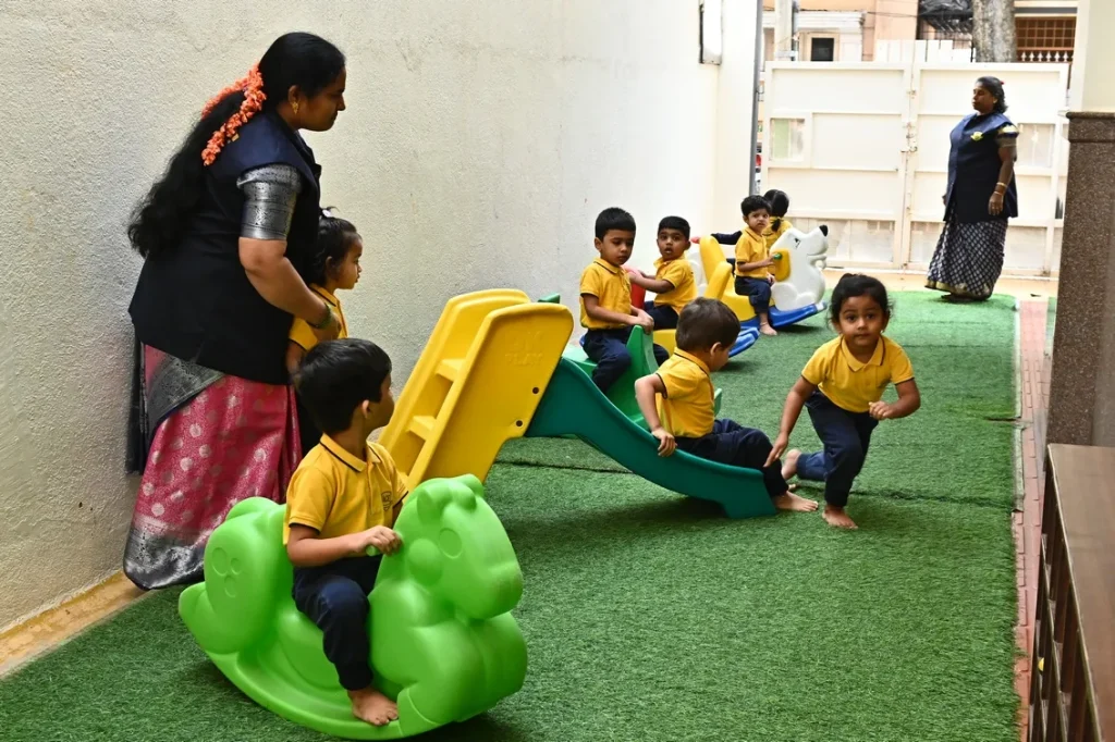 Children playing safely on the slide at ACE Montessori, Padmanabhanagar and Jayanagar, Bangalore