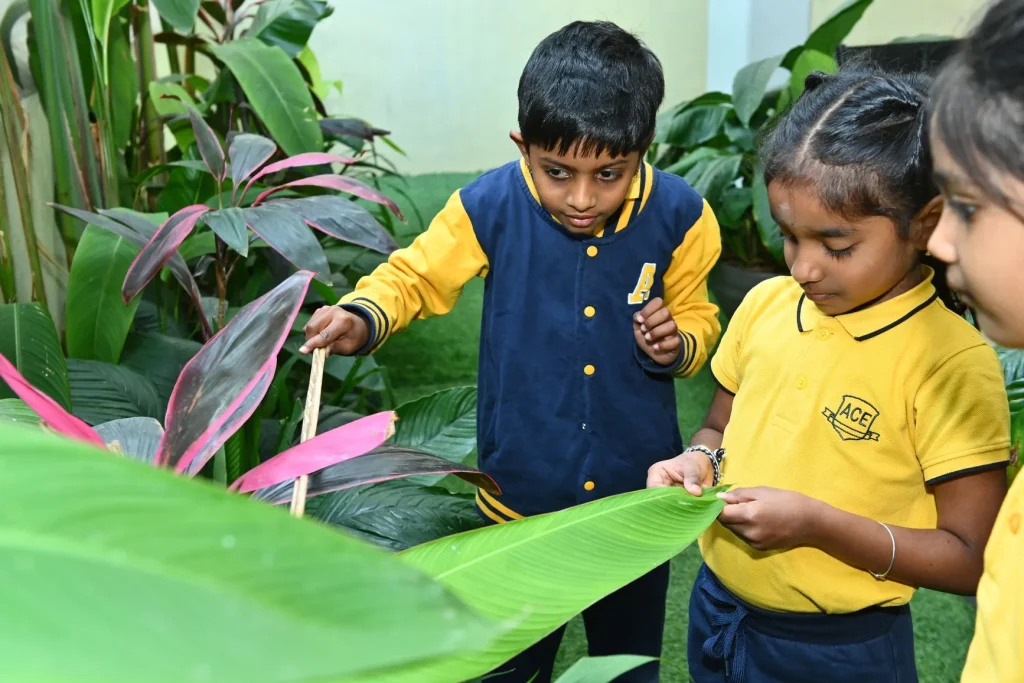 Happy child in the garden at ACE Montessori, Padmanabhanagar and Jayanagar, Bangalore